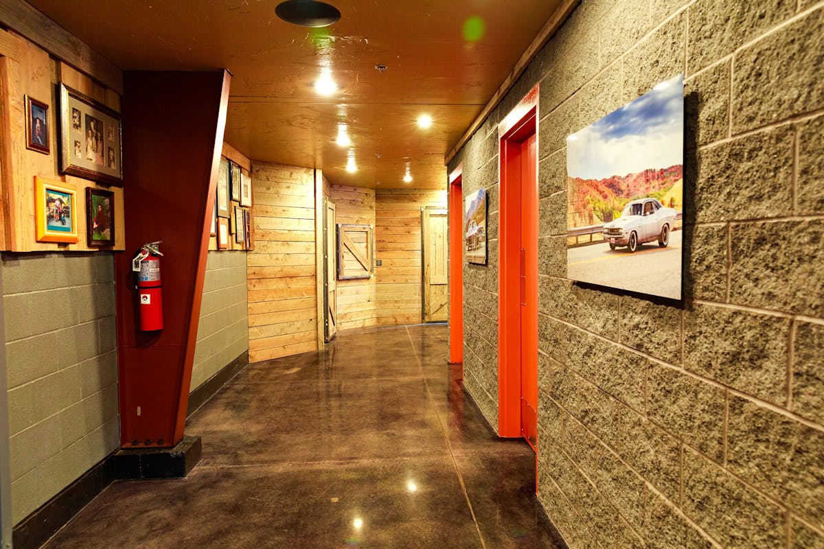 Hallway with photographs at Hanks Garage Venue