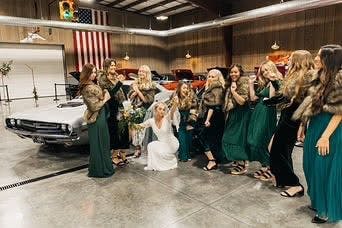 Bride celebrating with her bridal party